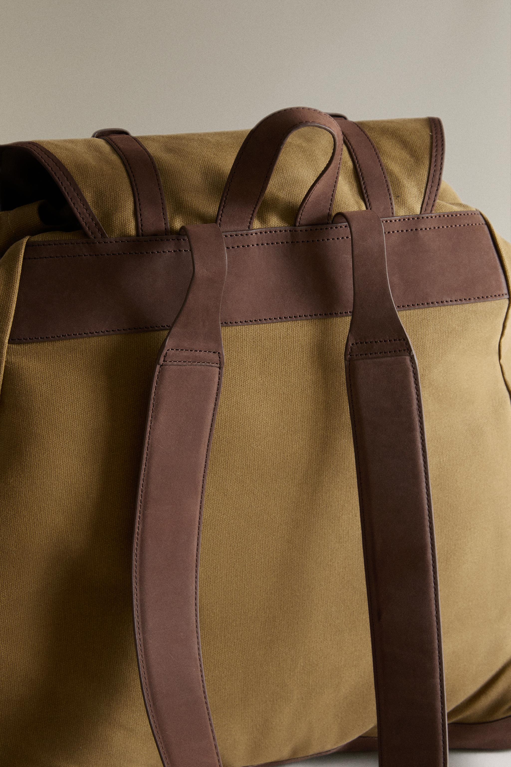 COTTON AND LEATHER BACKPACK